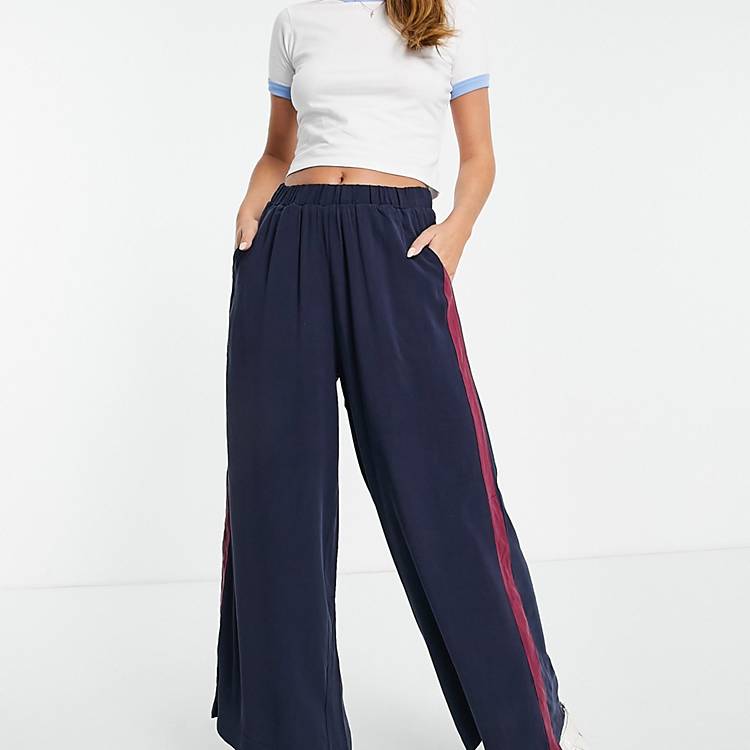 Native Youth wide leg pants in navy with side stripe and snap detail