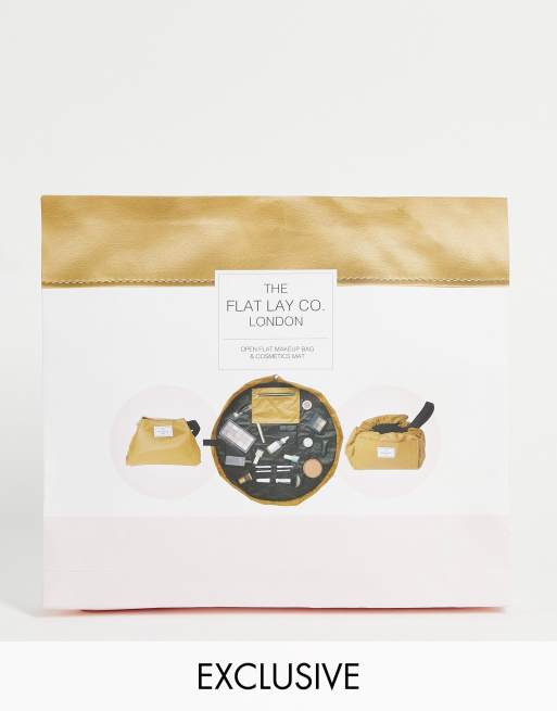 Neceser de maquillaje marrón medio de efecto cuero con cordón ajustable exclusivo de The Flat Lay Co. x ASOS