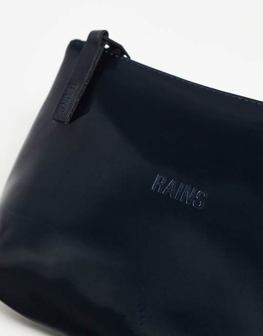 Neceser para cosméticos azul marino brillante impermeable 15600 de Rains, 2 de 3