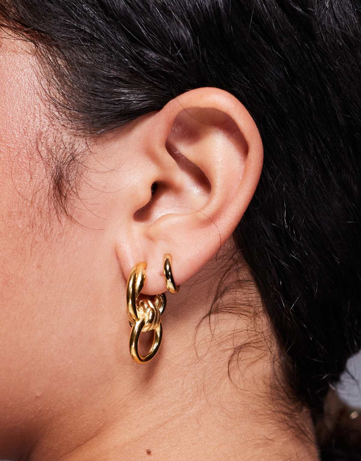 Neck On The Line statement doorknocker hoop earrings in gold plated