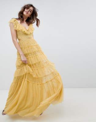 needle and thread yellow dress