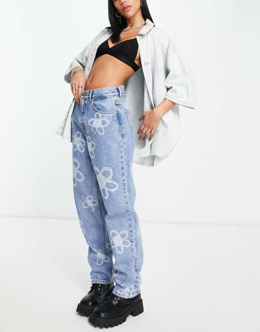 Neon & Nylon straight leg jeans in mid blue with flower print