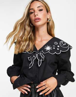 Neon Rose blouse with exaggerated collar with celestial embroidery