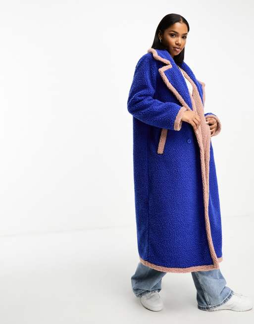 Neon Rose borg stitch edged longline coat in blue