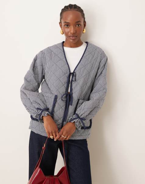 Neon Rose check print quilted overcoat in navy - view 1