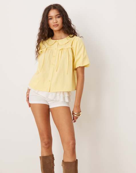 Neon Rose - Citrongul bluse med plisseringer, sløjfedetalje og pufærmer - view 1