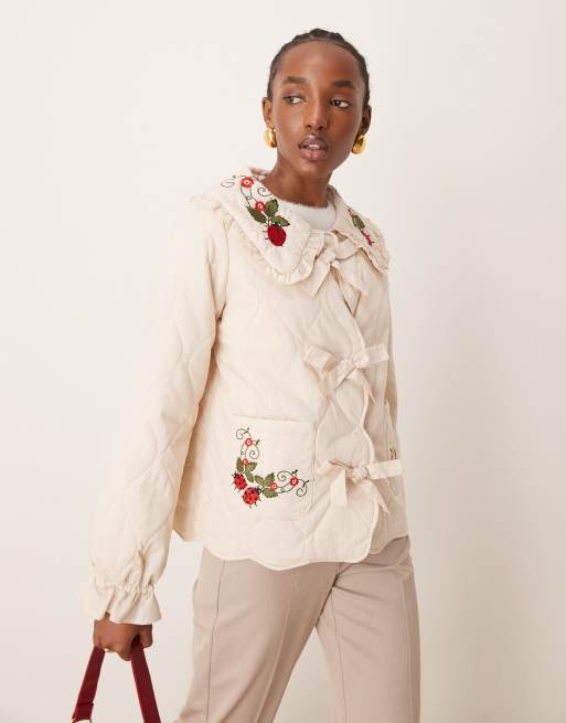 Neon Rose embroidered quilted overcoat in cream