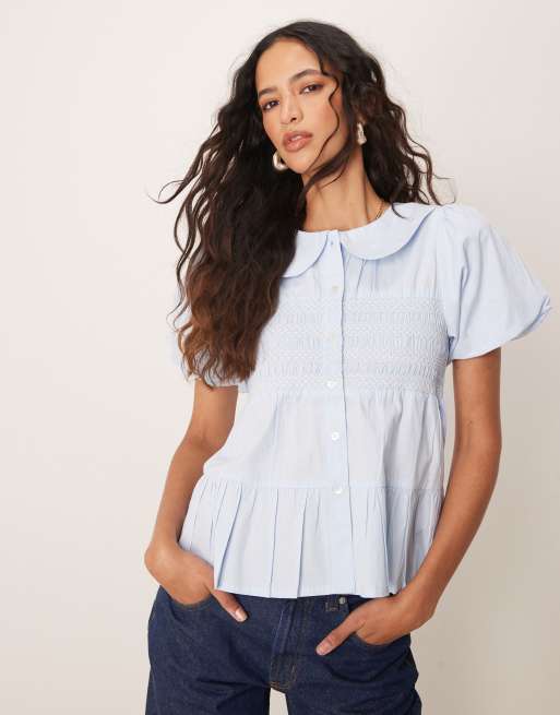 Neon Rose - Gesmokte blouse met pofmouwen in lichtblauw 