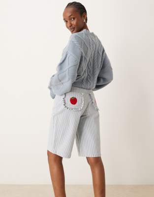 hickory striped tomato embroidered jorts in light blue