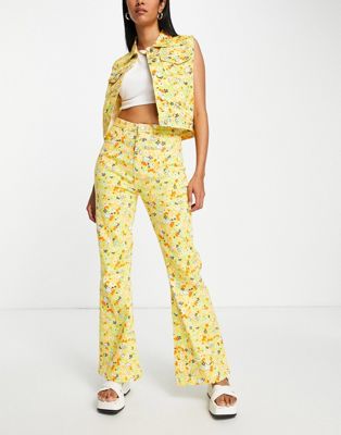 Neon Rose high waist flare jeans in 70s floral denim co-ord