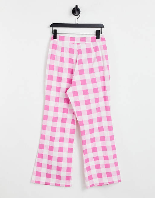 Women Neon Rose kick flare trousers with frill edge pockets in check co-ord 
