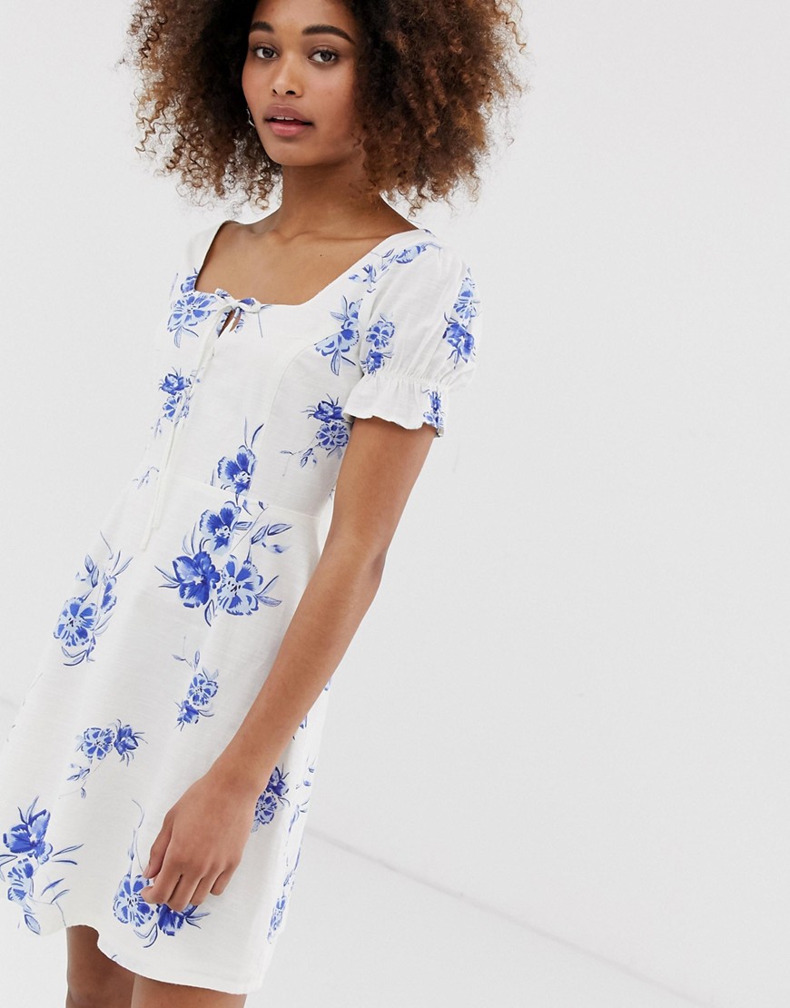 Neon Rose tea dress in floral embroidered fabric-Blue