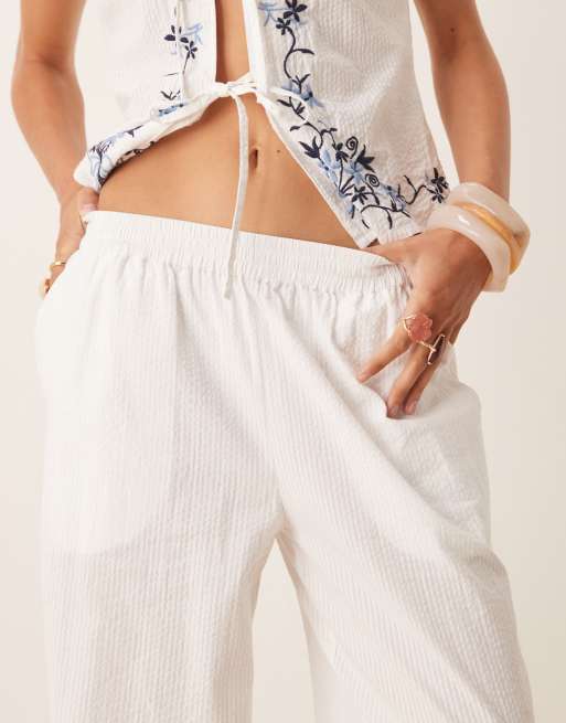 Neon Rose tie-side embroidered trousers co-ord in white and blue, 3 of 5