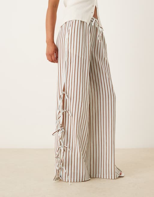 Neon Rose tie-side relaxed fit striped trousers in multi