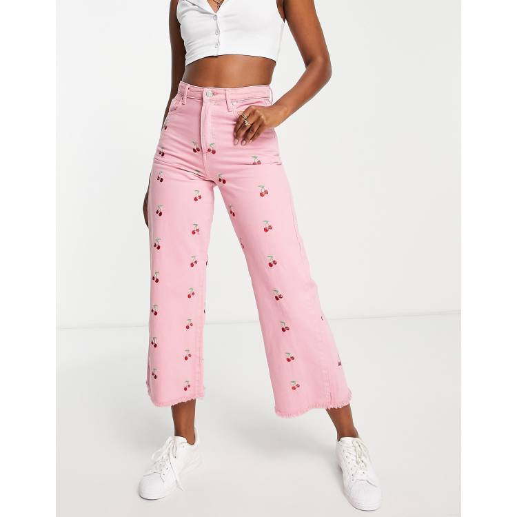 Neon Rose wide leg jeans in washed pink cherry embroidery