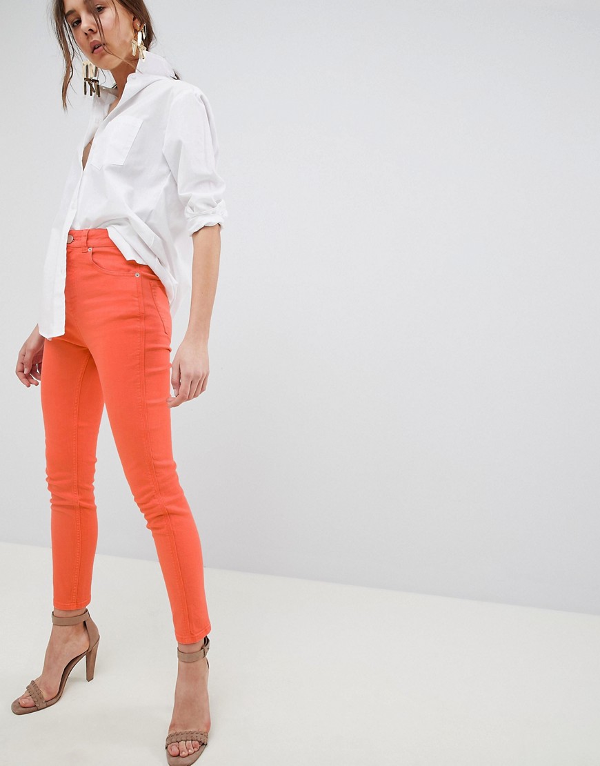 Neonorange smalle højtaljede 80'er-jeans med kontrastsyninger fra ASOS DESIGN