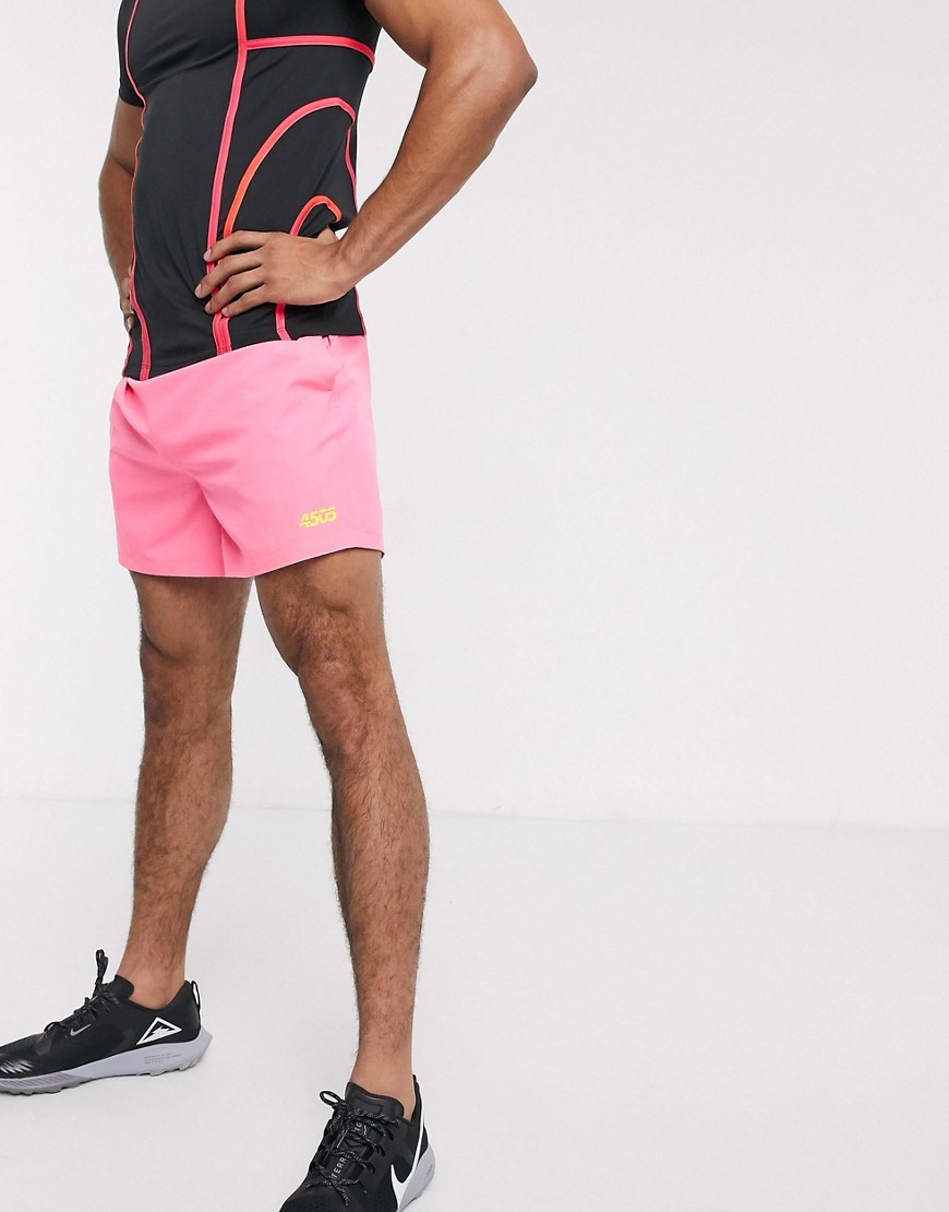 фото Неоново-розовые спортивные шорты средней длины asos 4505-розовый