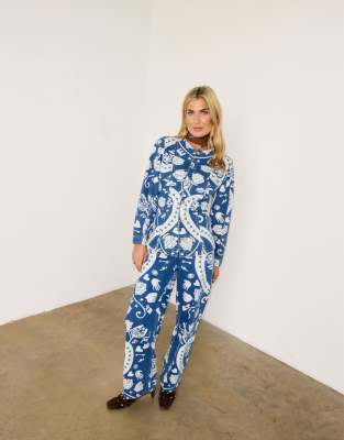 Never Fully Dressed Amara Printed Denim Structured Balloon Sleeve Jacket In Blue