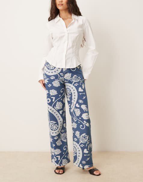 Never Fully Dressed Amara printed ruffle back pocket detail straight leg jeans in blue - view 1