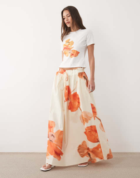 Never Fully Dressed – Bawełniana spódnica maxi w pomarańczowy kwiatowy wzór - view 1