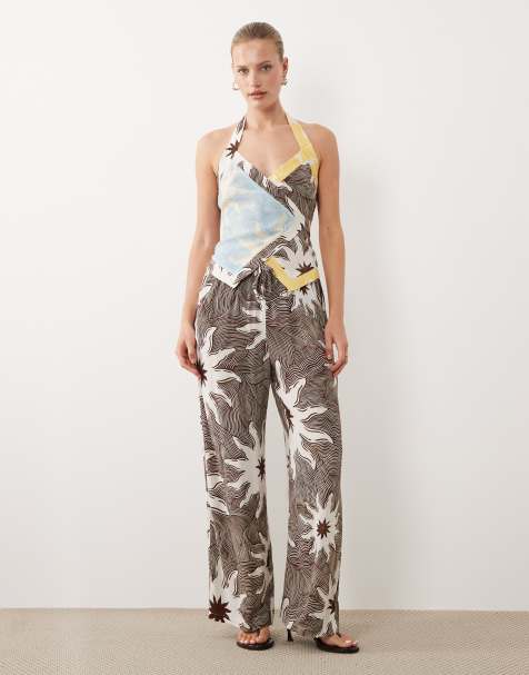 Never Fully Dressed – Czarny kopertowy top z dekoltem typu halter we wzór soleil, część zestawu - view 1