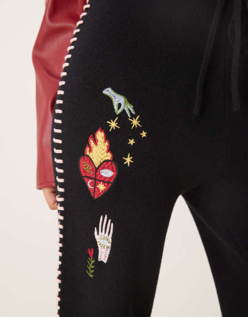 Never Fully Dressed flame heart knitted jogger in black, 3 of 5