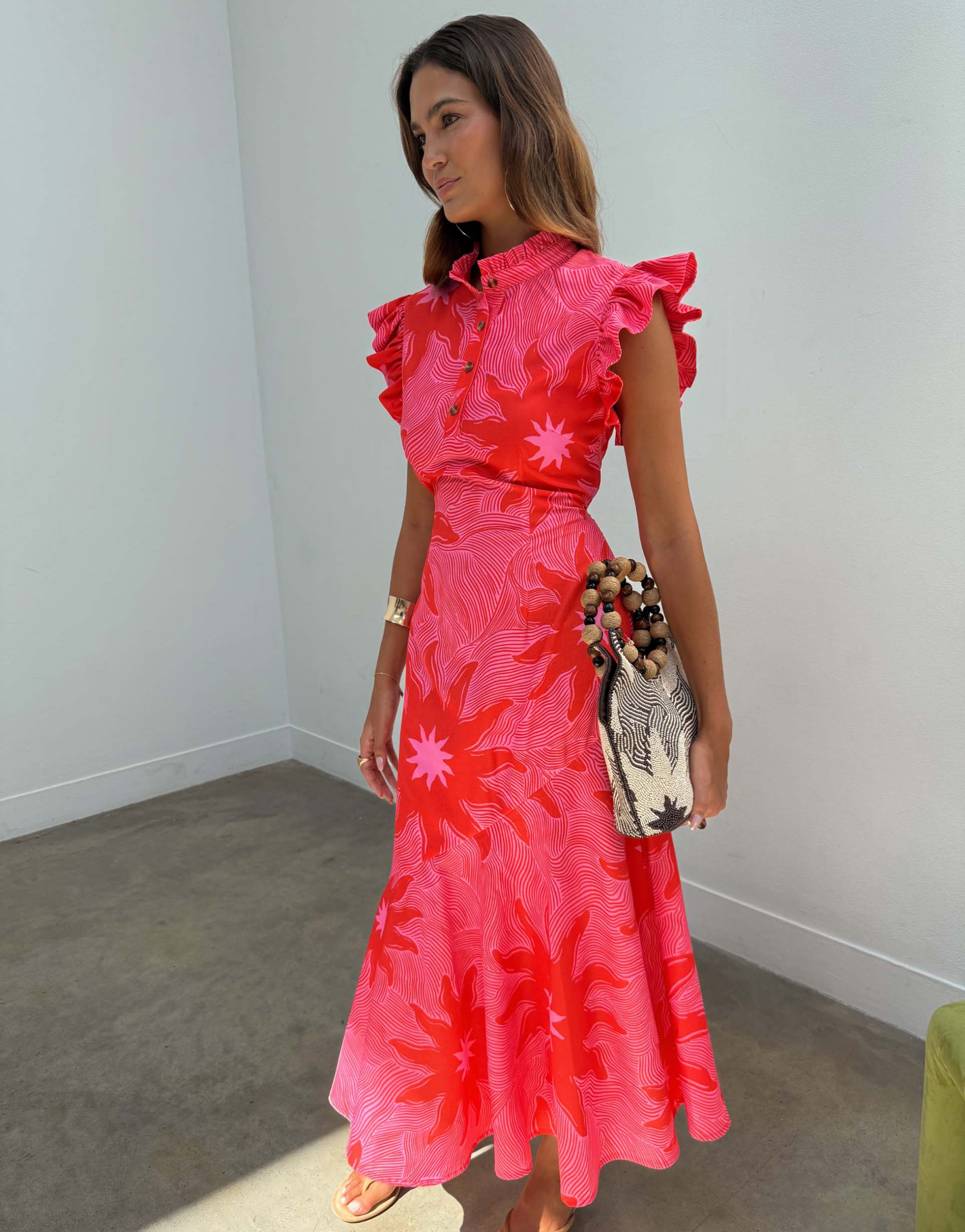 never fully dressed frida high neck frill sleeve midi dress in pink and red soleil print