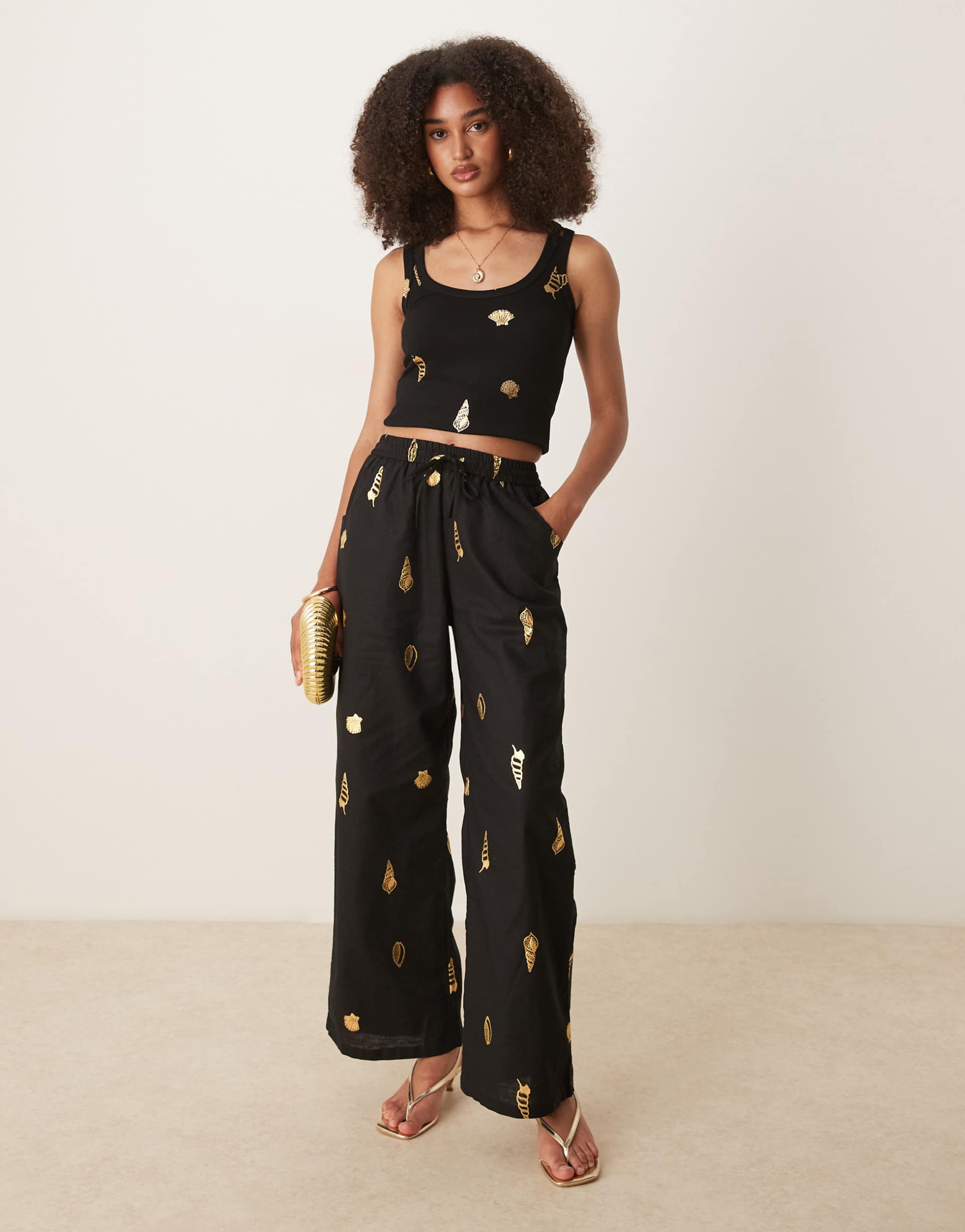 never fully dressed gold shell wide leg pants in black - part of a set