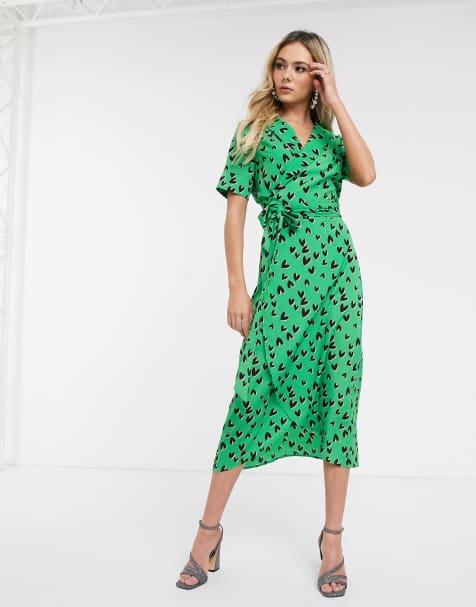 Never Fully Dressed – Grünes Maxikleid mit Wickeldesign vorn, sehr hohem Schlitz und Herz-Print