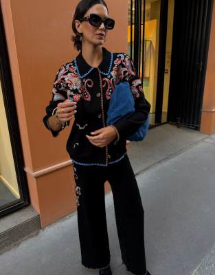 Never Fully Dressed Knit Wide Leg Embroidered Sweatpants In Black