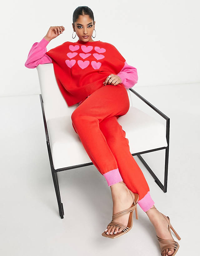 Never Fully Dressed - knitted trouser co-ord in contrast pink and red