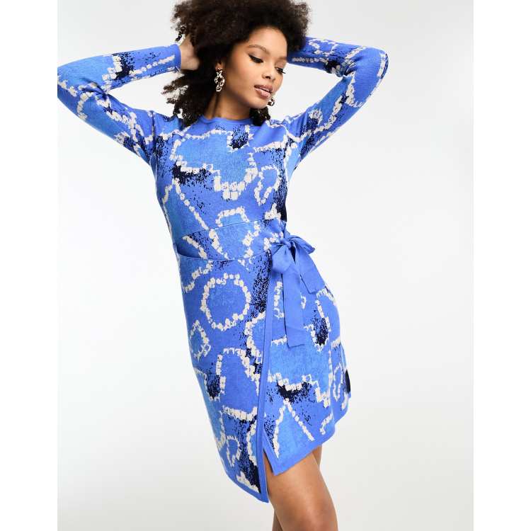 Never Fully Dressed knitted wrap mini dress in blue animal spot | ASOS