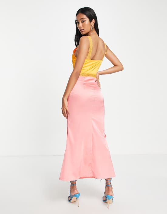 https://images.asos-media.com/products/never-fully-dressed-lace-cut-out-satin-midaxi-dress-in-color-block/202927997-3?$n_550w$&wid=550&fit=constrain