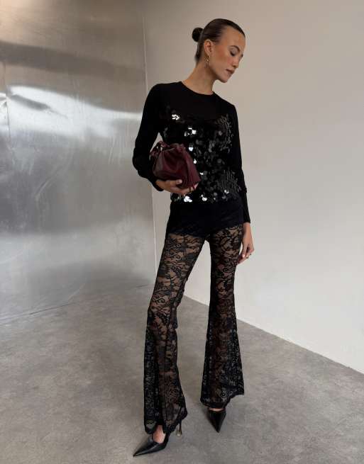 Never Fully Dressed lace in built shorts flare pants in black, 3 of 3