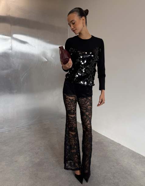 Never Fully Dressed lace in built shorts flare trousers in black - view 1