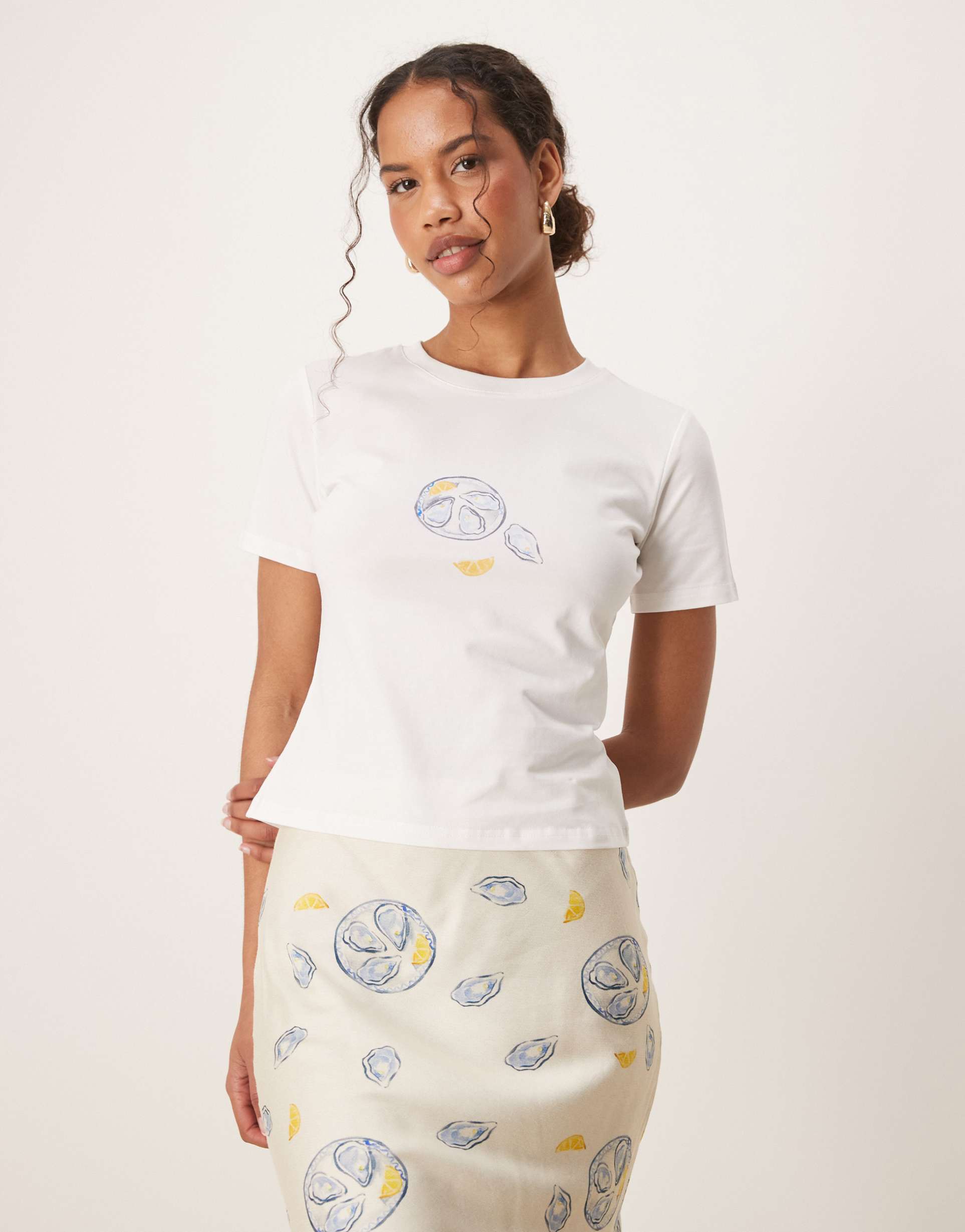 never fully dressed lemon print baby tee in oyster - part of a set