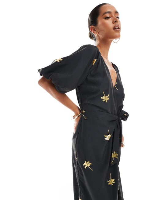 Never Fully Dressed metallic wrap midaxi dress in black gold shell | ASOS