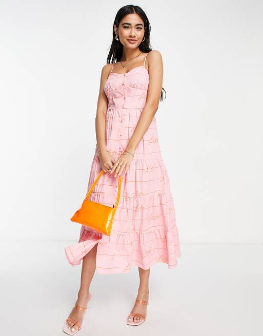 Never Fully Dressed - Midi jurk met 'Love' print in roze