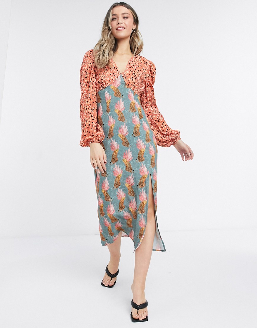 Never Fully Dressed – Midiklänning med benslits och kontrasterande mönster med prickar på överdelen och leopard-tryck på kjolen-Olika färger