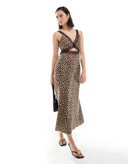 Never Fully Dressed - Mimi - Maxikjole med blondedetaljer og udskæringer i leopardprint
