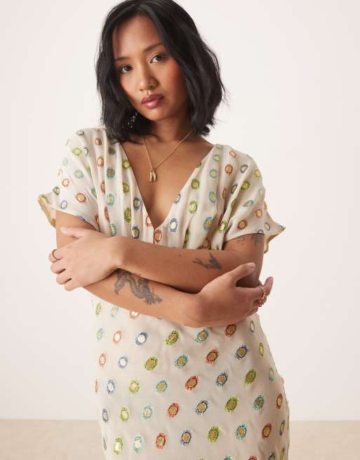 Never Fully Dressed Petite multi-color gold foil maxi dress in cream | ASOS