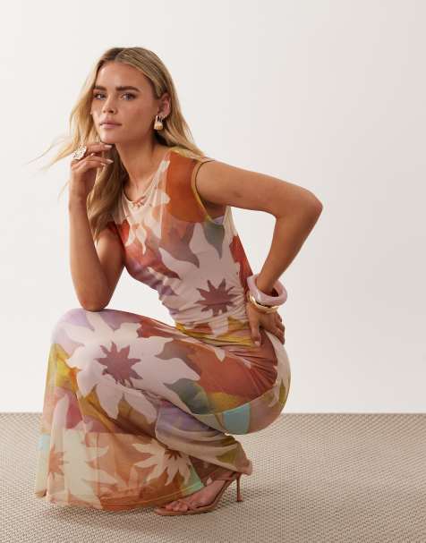 Never Fully Dressed Petite – Netzstoff-Maxikleid mit U-Boot-Ausschnitt und „Soleil“-Print in Pastellfarben - view 1