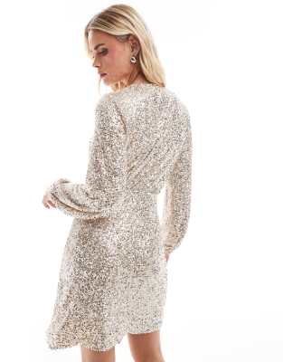 Never Fully Dressed Petite Vienna sequin wrap mini dress in silver | ASOS