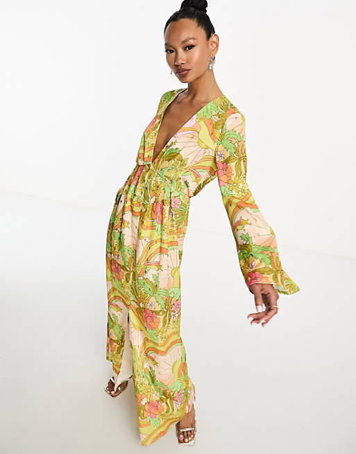 Never Fully Dressed plunge pleated maxi dress in sunset tropic print | ASOS