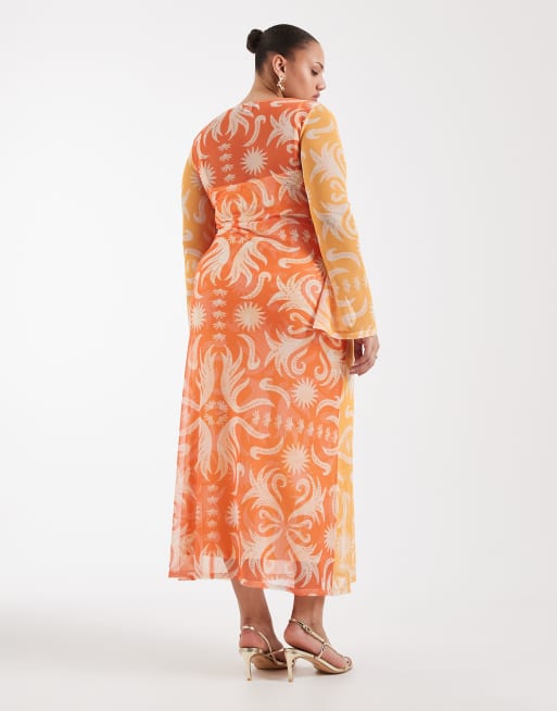 Never Fully Dressed Plus – Cairo – Wendbares Maxikleid aus Netzstoff in Orange mit Sonnen-Print, 2 von 4