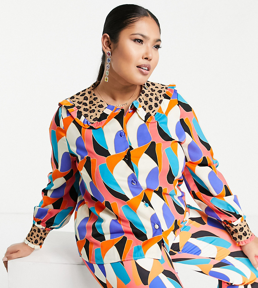 Plus-size blouse by Never Fully Dressed Part of a co-ord set Trousers sold separately Peter Pan collar Button placket Blouson sleeves Button cuffs Regular fit
