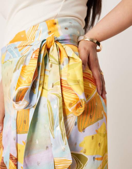 Never Fully Dressed Plus Jaspre wrap midaxi skirt in mixed print | ASOS
