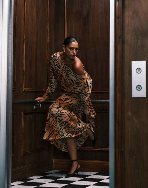 Never Fully Dressed Plus plisse off-shoulder maxi dress in tiger print |  ASOS
