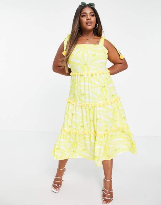Never Fully Dressed Plus Robe mi longue a imprime soleil avec pompons et volants etages Jaune ASOS