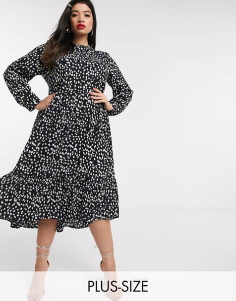 Never Fully Dressed Plus – Trapezförmiges Maxikleid mit Rüschensaum und Fleckendesign in Schwarz-Weiß